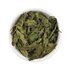Photo of a small bowl filled with the loose Stinging Nettle Tea from SONNENTOR.