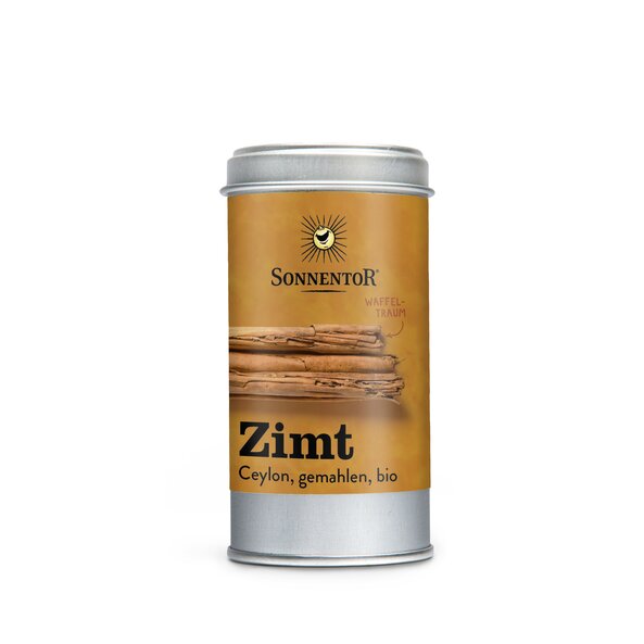 Photo of a Spice Tin Cinnamon Ceylon ground. On the Spice Tin is a picture of three cinnamon sticks.